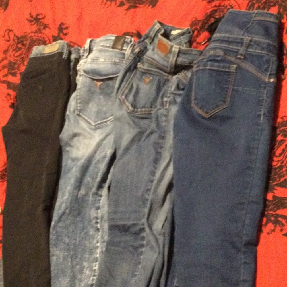 4 pair of jeans.  3 guess and 1 normal